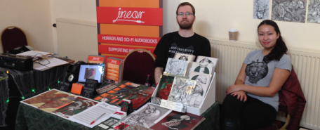 Thierry Heles and Michelle Harvey man the joint In Ear/Harvey Art stand at SCARdiff 2014.